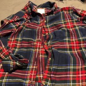 Multi colored flannel red, blue, yellow, green.